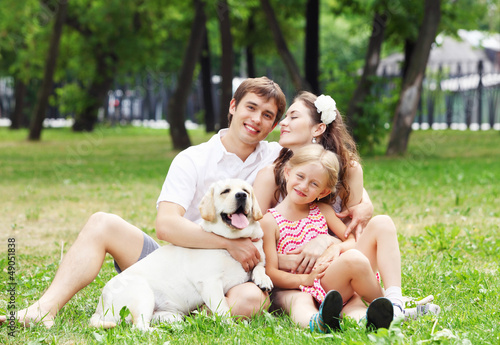 Photo: Happy family having fun outdoors Happy family having fun outdoors