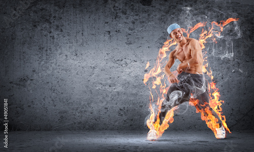 Photo: young man dancing hip hop with color lines young man dancing hip hop with color lines