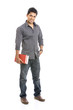 Foto: Indian young student carrying books on white. Indian young student carrying books on white.
