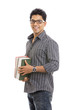 Foto: Indian young student carrying books on white. Indian young student carrying books on white.