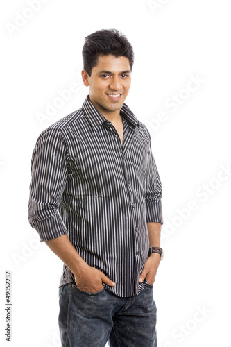 Photo: Smart Indian young man against on white background. Smart Indian young man against on white background.