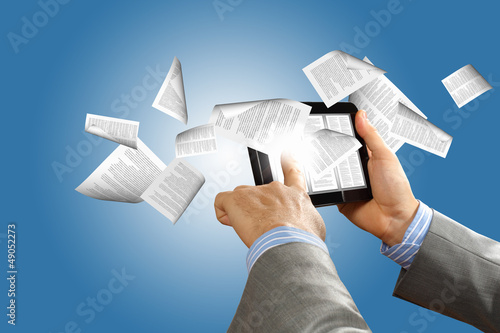 Photo: e book reader and books e book reader and books