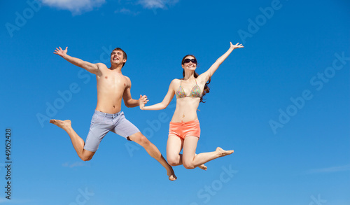 Photo: Happy Young Couple Together On The Beach Happy Young Couple Together On The Beach