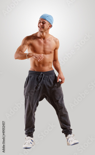 Photo: young man dancing hip hop young man dancing hip hop