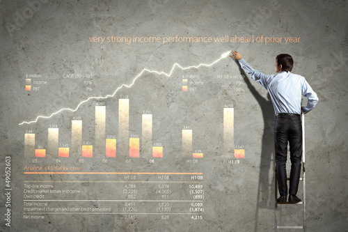 Photo: businessman drawing diagram businessman drawing diagram