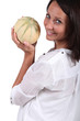 Woman holding melon