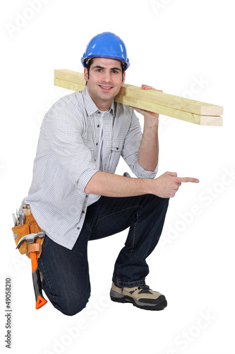 Photo: woodworker pointing at something woodworker pointing at something