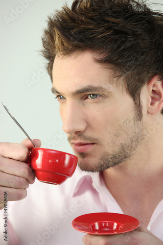 Photo: Man with red coffee cup Man with red coffee cup