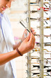 Young man at optician with glasses