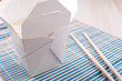 Rice in paper box with chopsticks