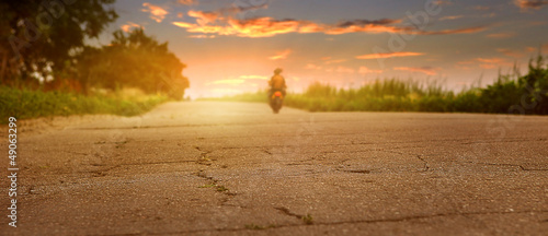 Photo: Old road closeup image at sunset time Old road closeup image at sunset time