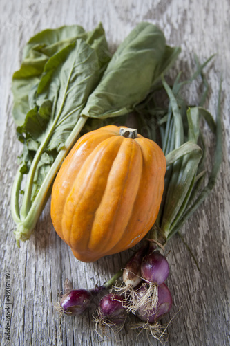 Photo: Farm Fresh Vegetables on Wooden Board Farm Fresh Vegetables on Wooden Board