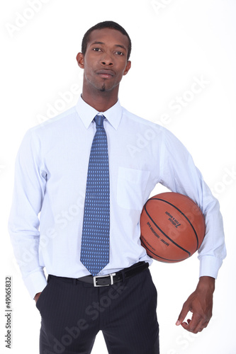 Photo: Businessman longing for his younger days Businessman longing for his younger days
