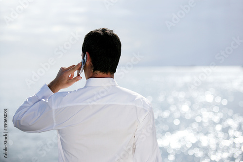 Photo: man talking on the phone man talking on the phone