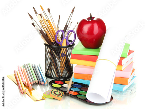 Photo: School supplies isolated on white School supplies isolated on white