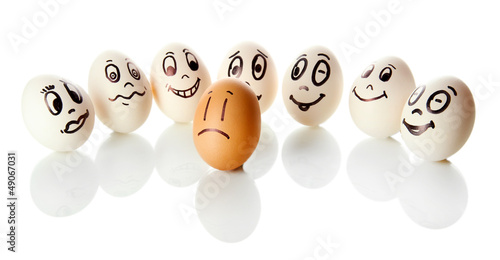 Photo: Eggs with funny faces isolated on white Eggs with funny faces isolated on white