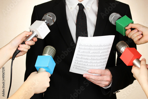Photo: Conference meeting microphones and businessman Conference meeting microphones and businessman