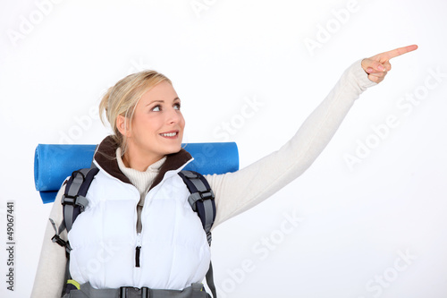 Photo: Hiker pointing to something Hiker pointing to something