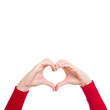 Female hands showing heart sign