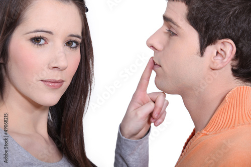 Photo: Girlfriend shushing boyfriend Girlfriend shushing boyfriend