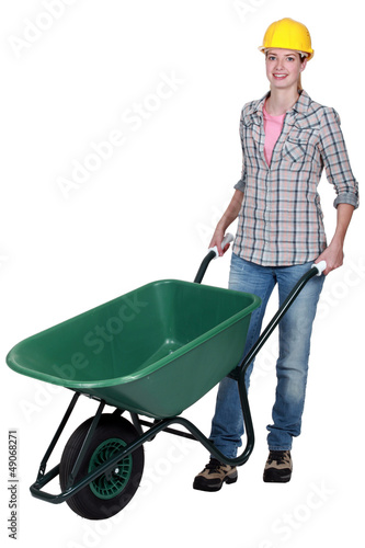 Photo: Woman with wheelbarrow Woman with wheelbarrow