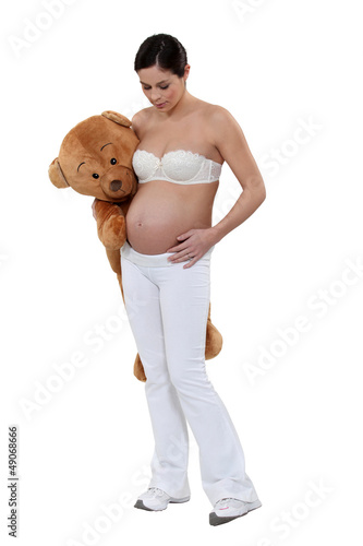 Photo: Woman with a teddy bear Woman with a teddy bear