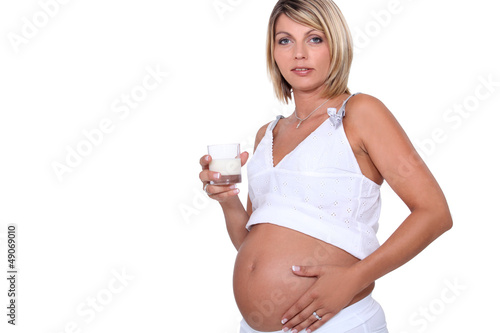 Photo: Pregnant woman drinking milk Pregnant woman drinking milk