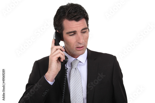 Photo: Businessman making important call Businessman making important call