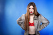 sexy woman in fur coat and red bra