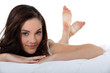 beautiful woman lying in her bed