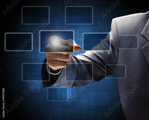 Photo: businessman hand pressing a button businessman hand pressing a button