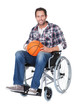 Man in wheelchair with basketball