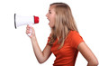 Photo: Girl shouting in loud speaker Girl shouting in loud speaker