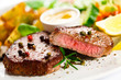 Grilled steak, baked potatoes and vegetables Grilled steak, baked potatoes and vegetables