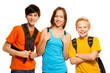 Photo: Three kids with school backpacks Three kids with school backpacks
