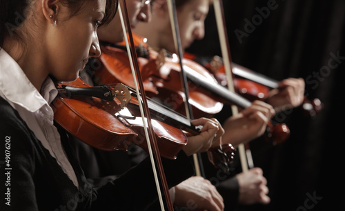 Photo: violinists at concert violinists at concert