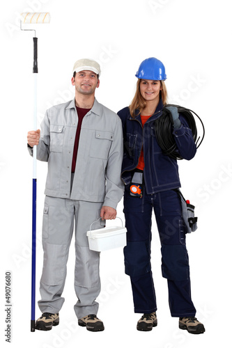Photo: Male decorator female electrician Male decorator female electrician
