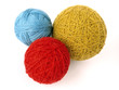 three colorful wool skeins