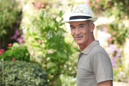 Photo: mature gentleman in garden mature gentleman in garden
