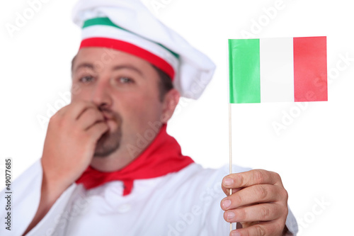 Photo: Chef holding Italian flag Chef holding Italian flag
