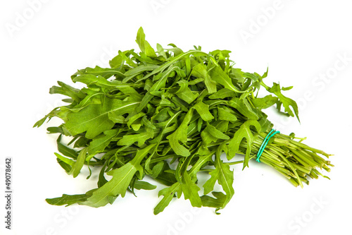 Photo: Arugula/rucola fresh heap leaf on white Arugula/rucola fresh heap leaf on white
