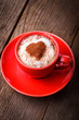Red cup with cappuccino