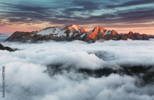 Photo: Beautiful spring landscape in the mountains. Sunset - Italy Dolo Beautiful spring landscape in the mountains. Sunset - Italy Dolo