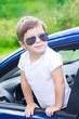 Photo: Мальчик выглядывает из окна машины Мальчик выглядывает из окна машины