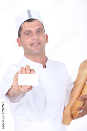 Photo: Baker showing card Baker showing card