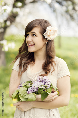 Photo: Portrait of elegant beautiful girl outdoors Portrait of elegant beautiful girl outdoors