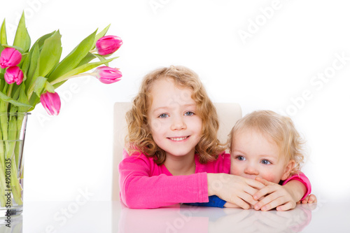 Photo: happy kids with flowers happy kids with flowers