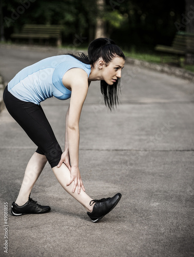 Photo: Young woman stretching Young woman stretching