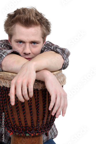 Photo: young man playing drums young man playing drums