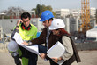 Foreman explaining upcoming work to colleagues
